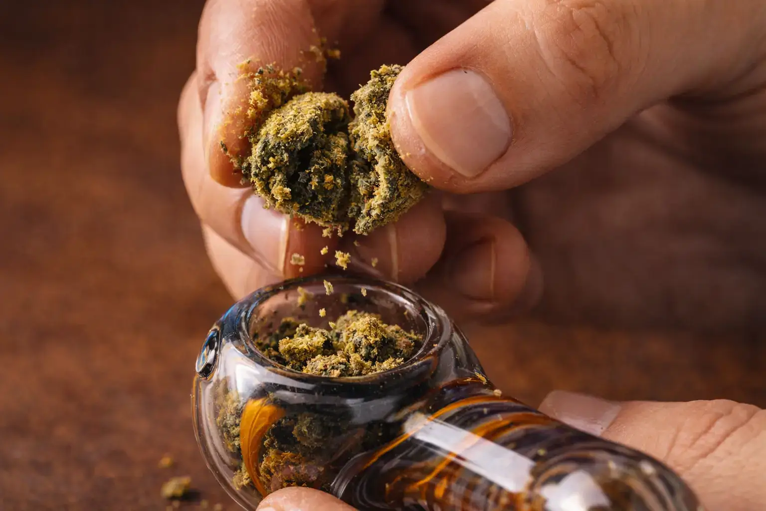 How to smoke Kurupts Moonrocks by breaking them by hand over a glass pipe bowl in California