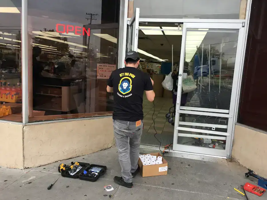 Locksmith Bowie Md Technician Installs And Services A Commercial Storefront Door To Keep A Bowie Business Secure And Open.