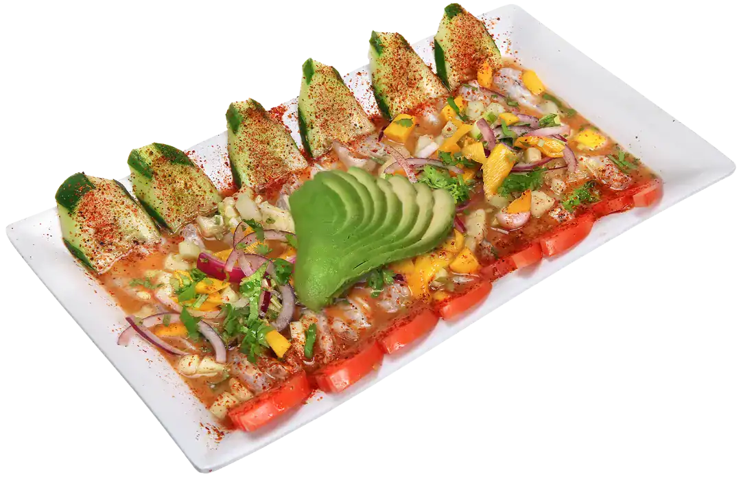Spicy shrimp aguachile with mango and habanero peppers on a white plate.