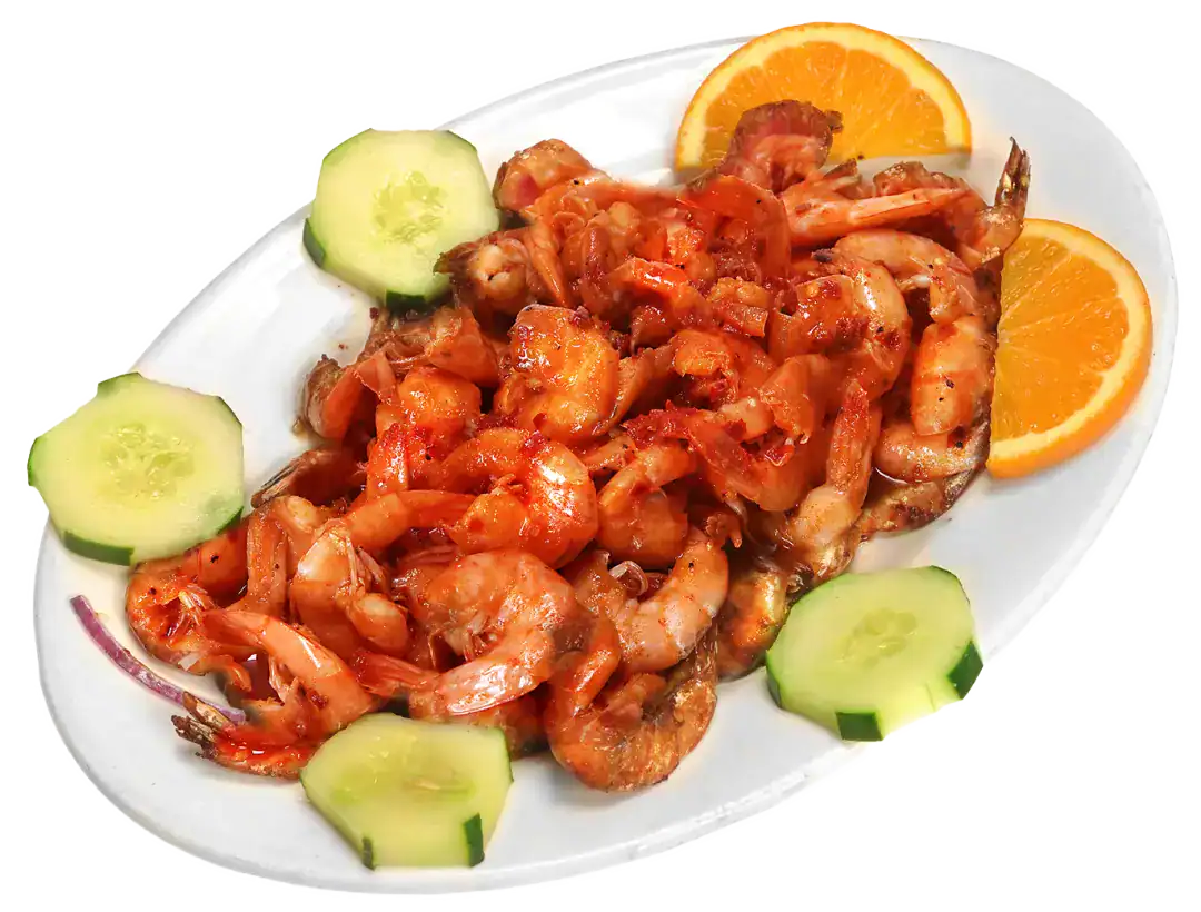 Delicious Camarones Coras HOT! served with cucumber and orange slices.