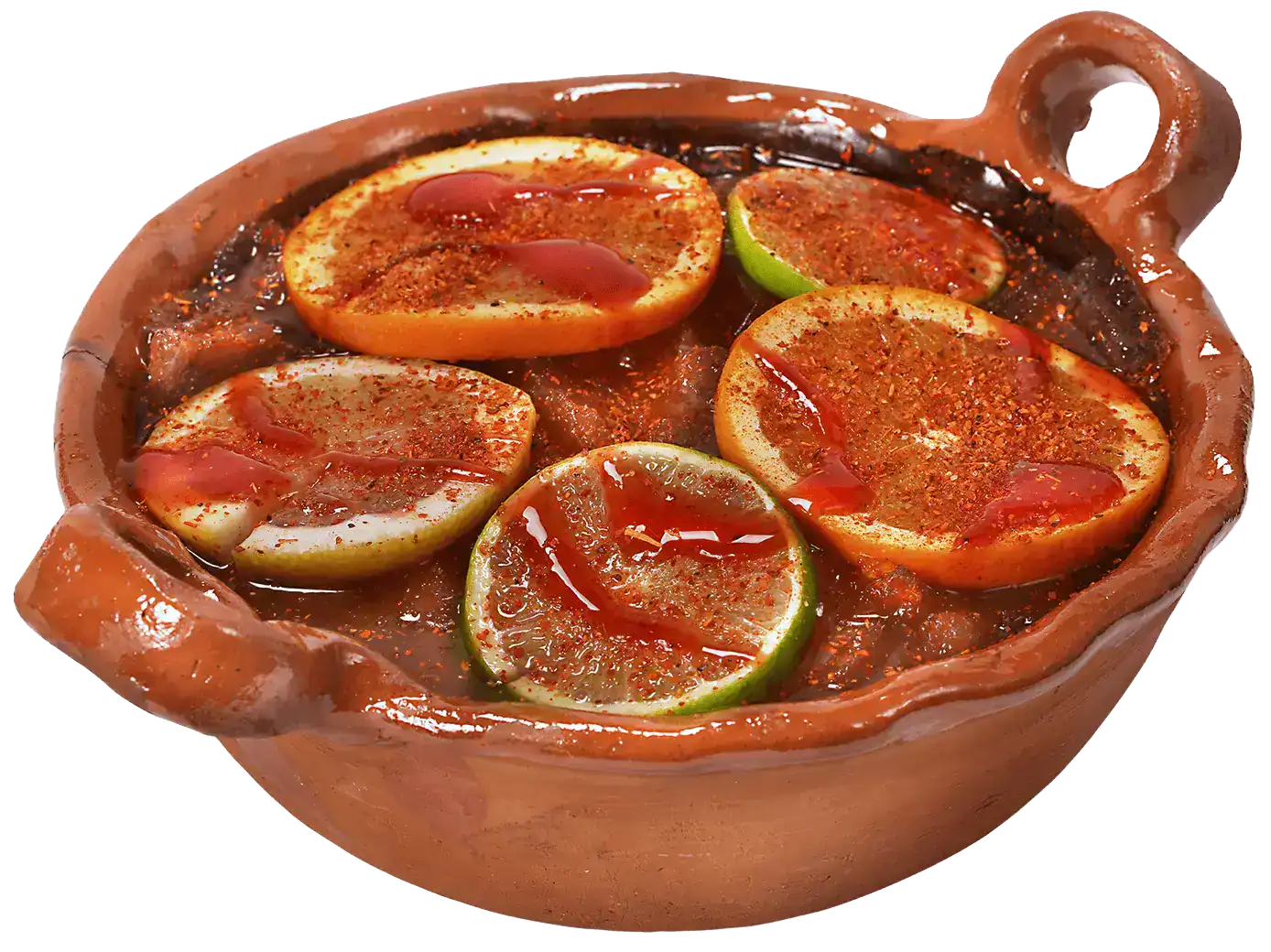 Cazuela dish with eggs, lime, and rich sauce in a clay bowl.