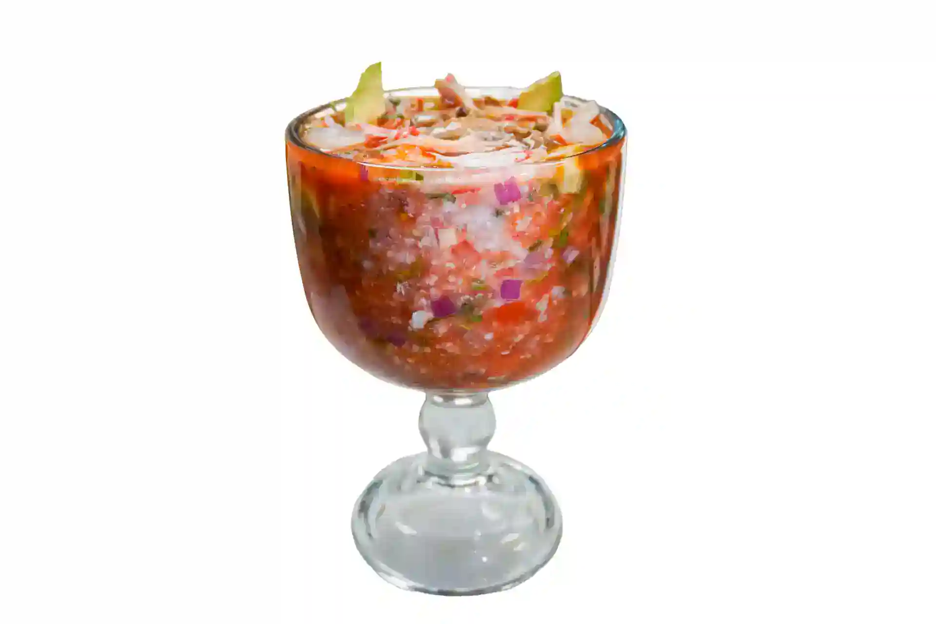 Mexican shrimp cocktail in a glass with lime and vegetables.