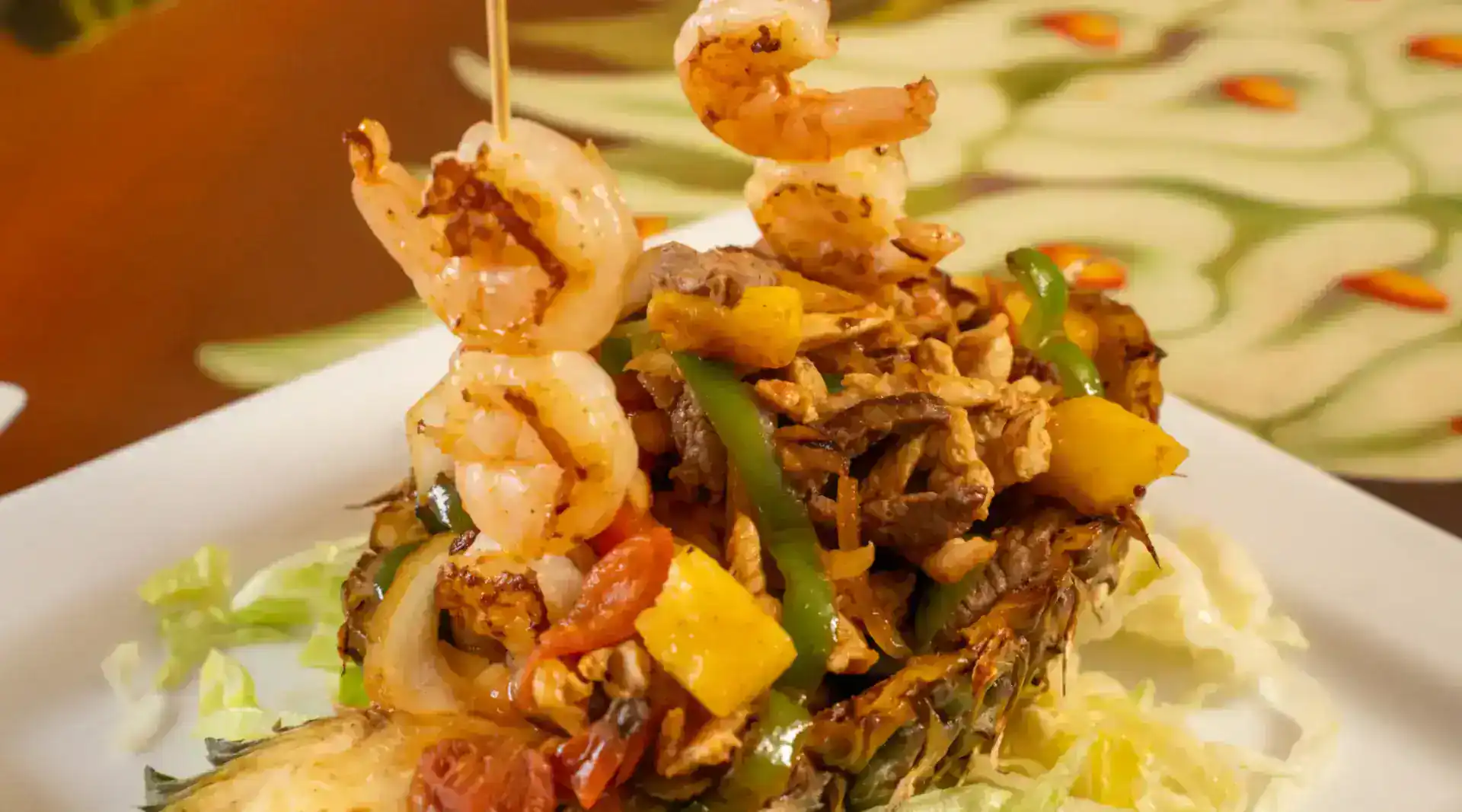 Delicious shrimp and vegetable dish served on a white plate.