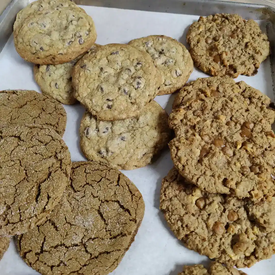 Delicious homemade cookies with chocolate chips and oats, perfect for snacking or sharing.