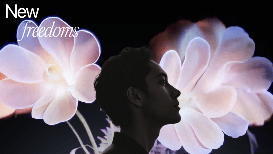 15 Best AI Image to Video Generator Free Tools: Which One’s Right for You? a man looking up at a flower