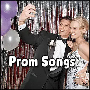 Young couple at prom taking a selfie with balloons and festive backdrop.