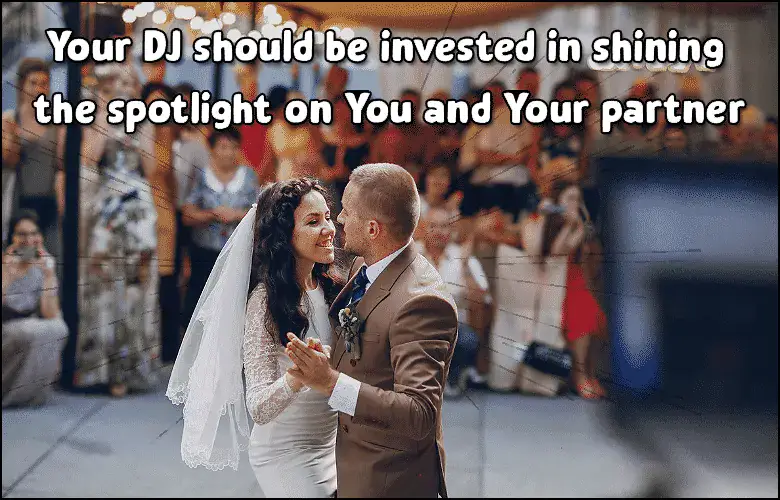 DJ at wedding with couple dancing, emphasizing spotlight on them.