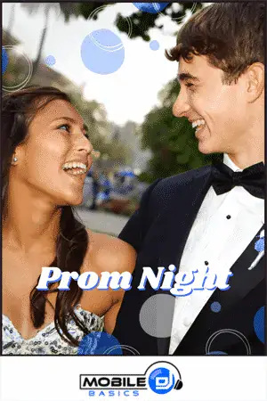 Young couple at prom night enjoying music and dancing outdoors.