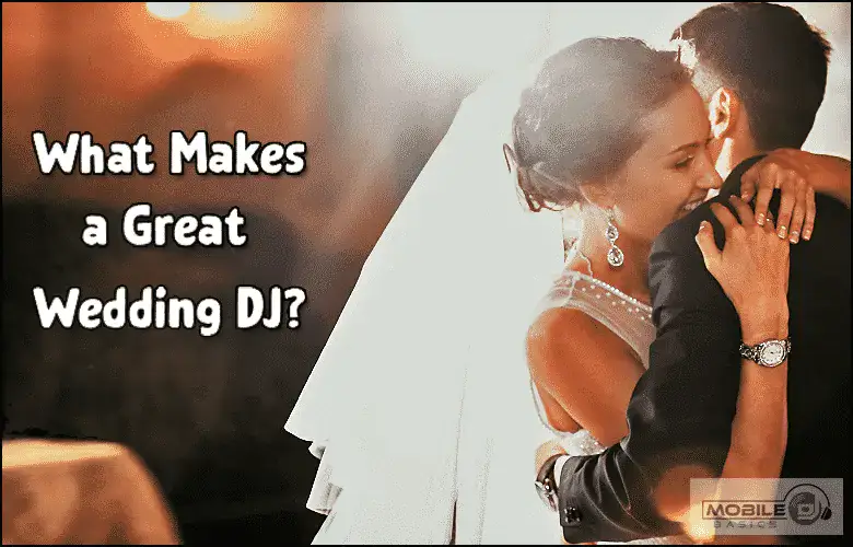 Wedding DJ playing music at a couple's dance with romantic lighting.