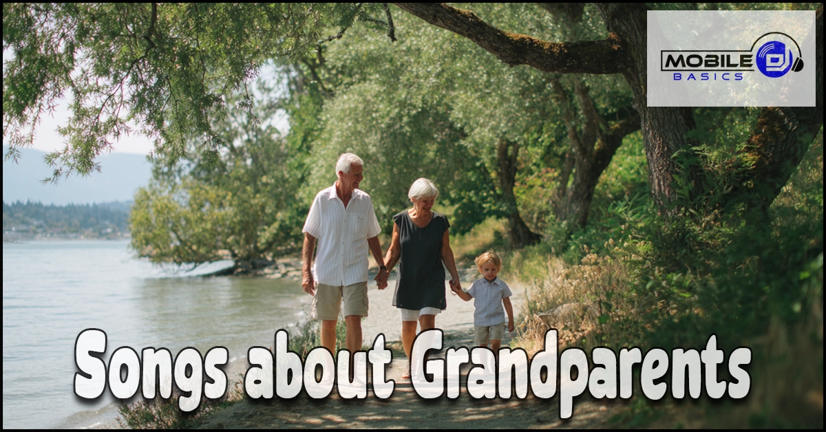 An elderly couple and a young child walk along a lakeside path under trees. Text reads: “Songs About Grandparents.” The Mobile Basics logo is in the upper right corner, highlighting heartfelt moments inspired by Songs About Grandparents.