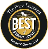 A polished circular badge in black, gold, and white proudly displays “The Best of Sonoma County” at its center, with “The Press Democrat” up top and “Readers’ Choice 2026” along the bottom edge. This trusted recognition reflects our commitment to delivering exceptional HVAC, plumbing, and drain services with clean workmanship and satisfaction guarantees you can rely on.