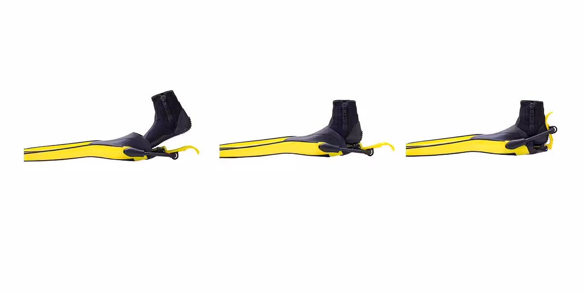 Palmes de plongée jaunes et noires, idéales pour explorer le monde sous-marin.