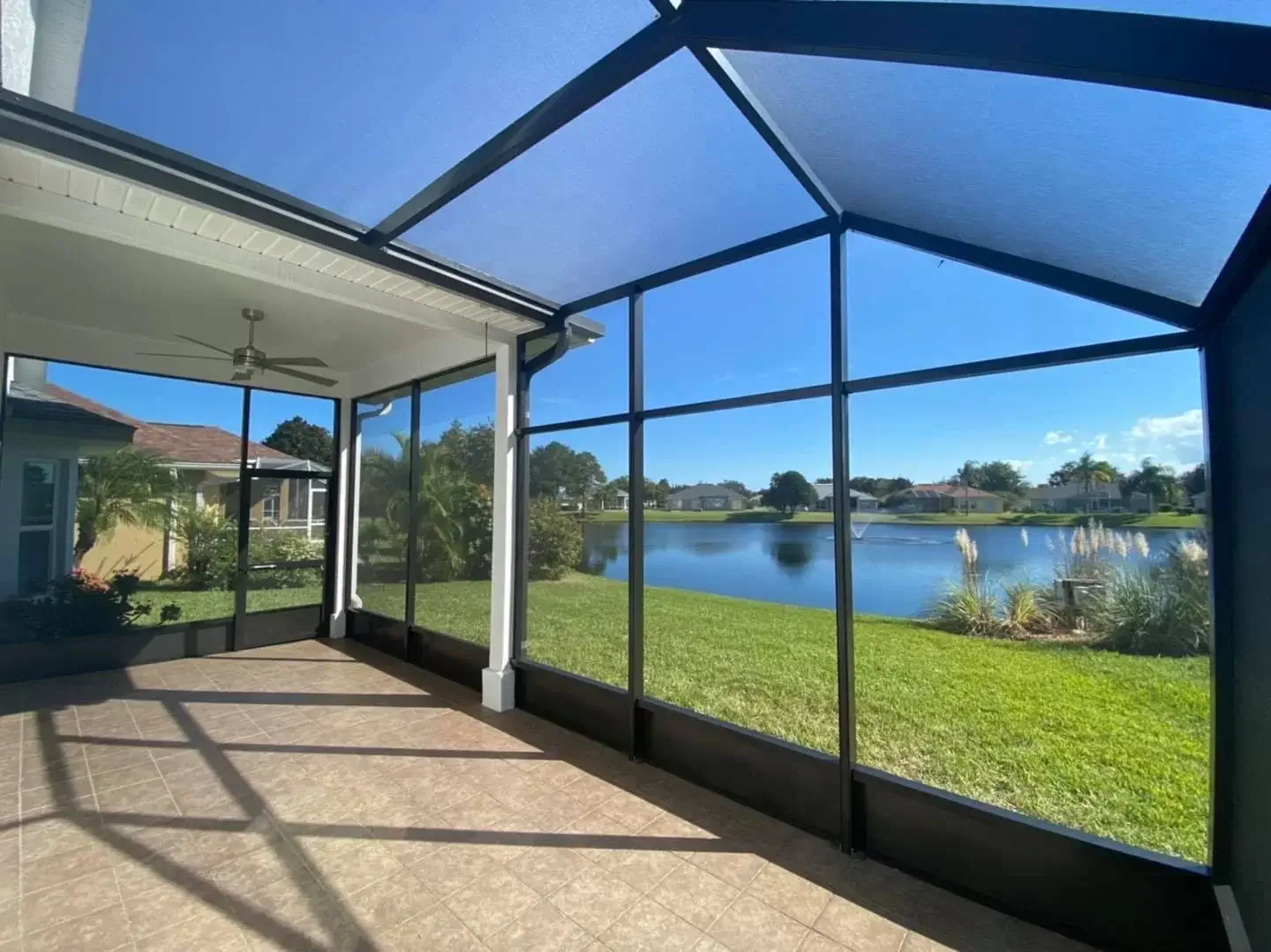 Entertain all of your family and guests in this beautiful birdcage screen enclosure that connects to your home.