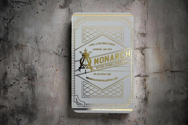4 round corner business card in traditional portrait size with gold foiling and soft touch velvet lamination