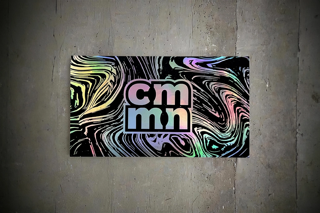 Business card with illusion holographic foiling in soft touch velvet lamination