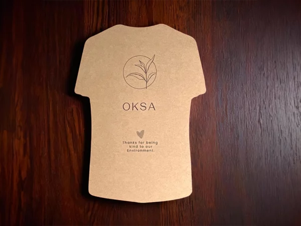 Specialty shaped t-shirt marketing card in kraft stock