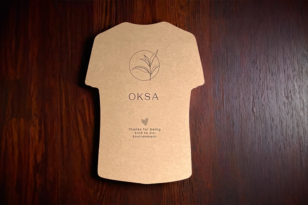 Specialty shaped t-shirt marketing card in kraft stock