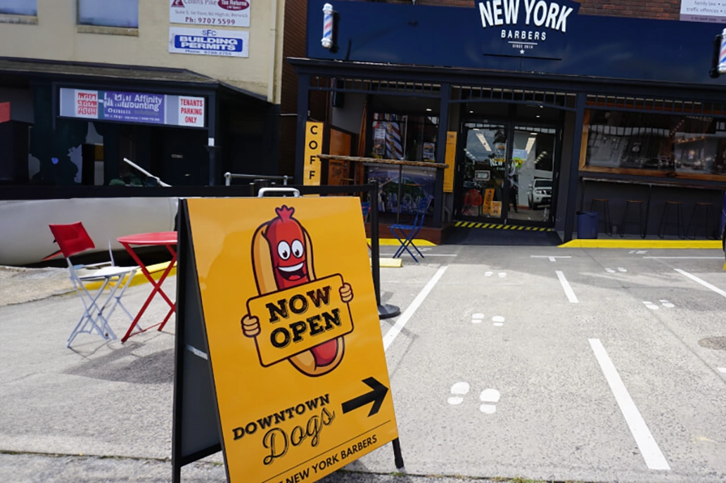 A frame displayed outside a barber shop