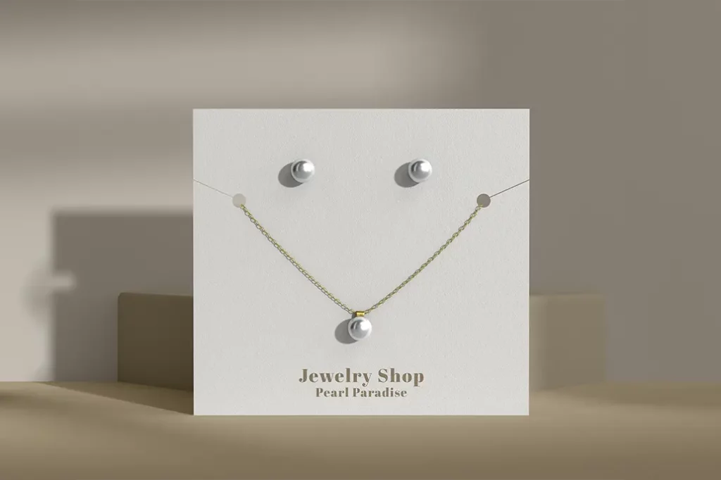 Necklace holder with drill hole for earring in an uncoated stock