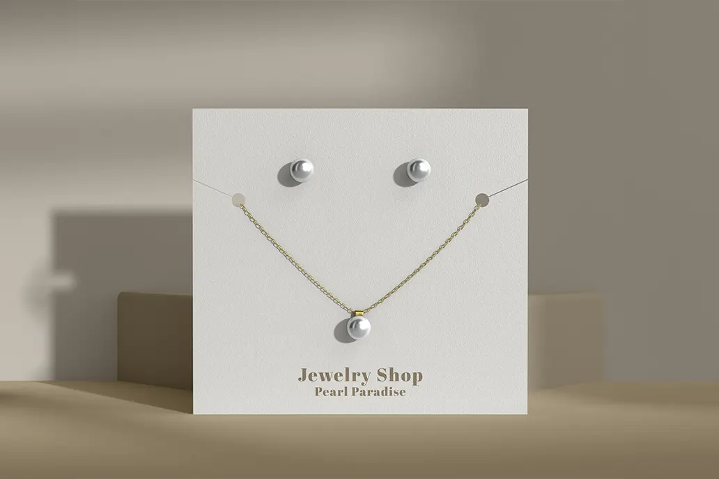 Necklace holder with drill hole for earring in an uncoated stock