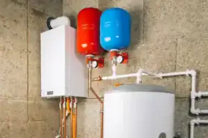 A reliable wall-mounted boiler, color-coded tanks, and a hot water cylinder installed by your trusted local home comfort experts.