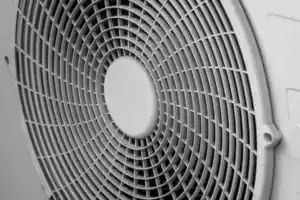 Close-up of a circular air vent with protective grill in a Brea, CA home—showcasing trusted local heat pump repair expertise.
