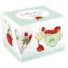 Taza de porcelana con diseño de fresas. Vista de la caja