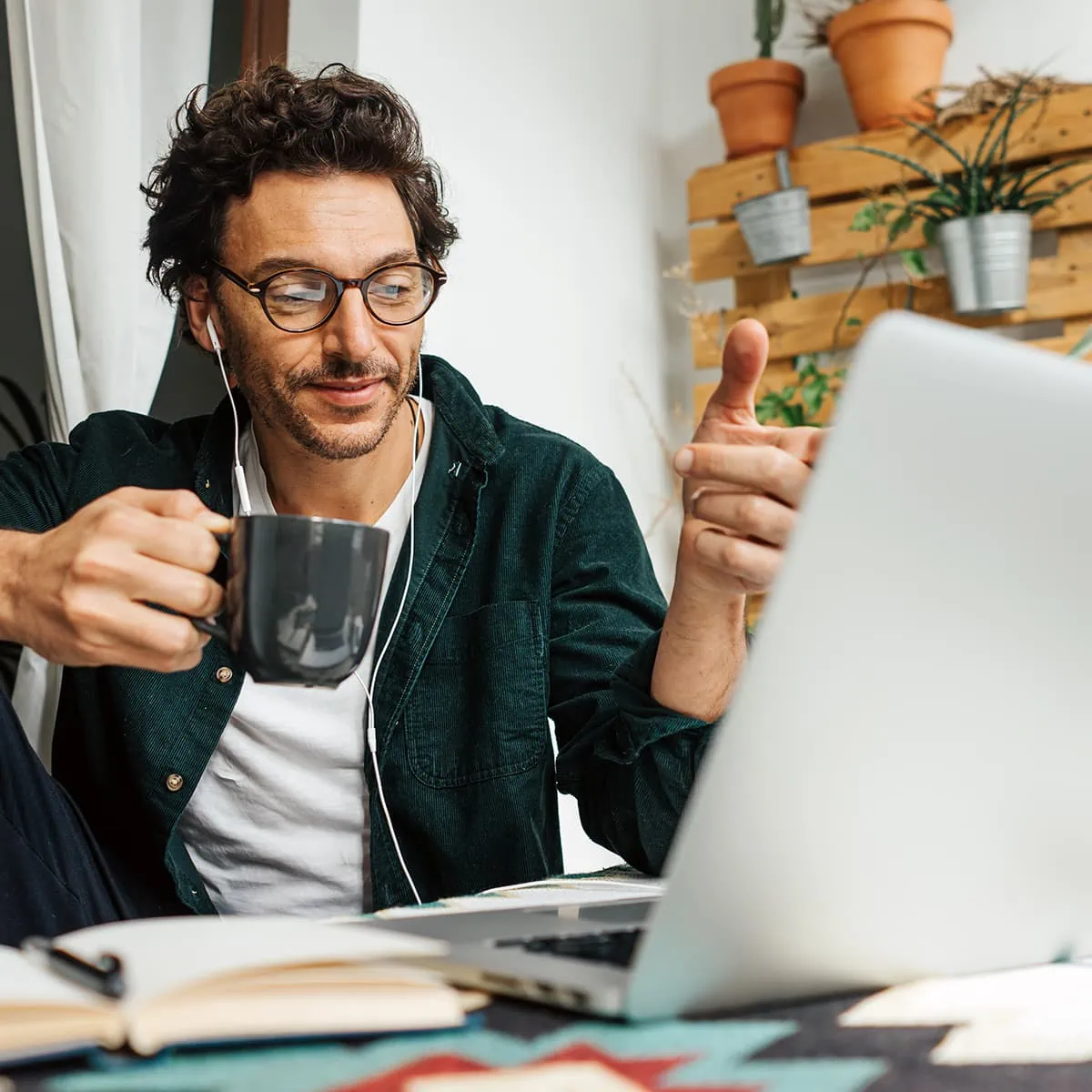 Man on meeting on laptop