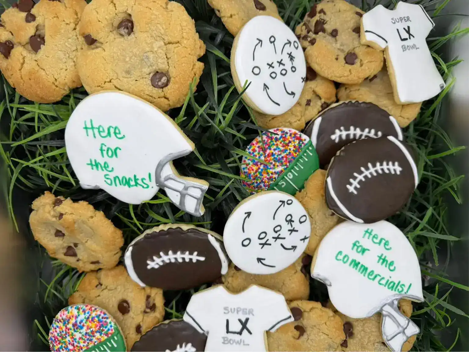 Decorative cookies with sports and snack-themed icing for Smutz Girls Bakery.