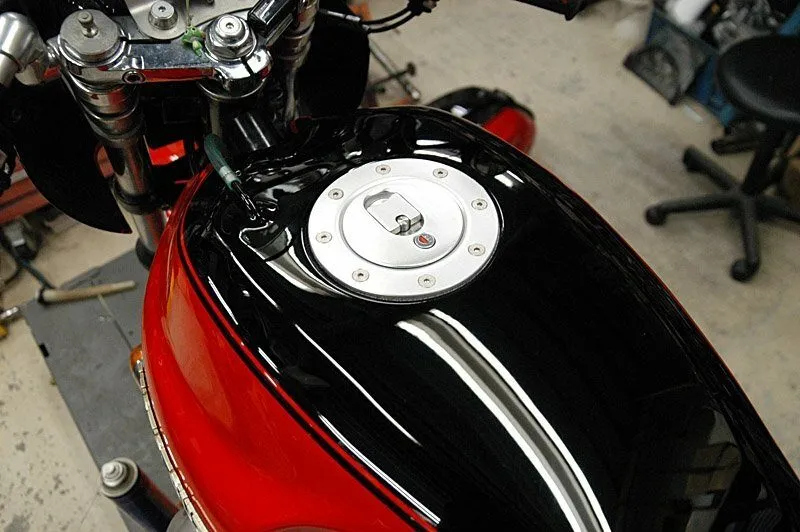 Aero cap compliments this Moto Guzzi tank perfectly