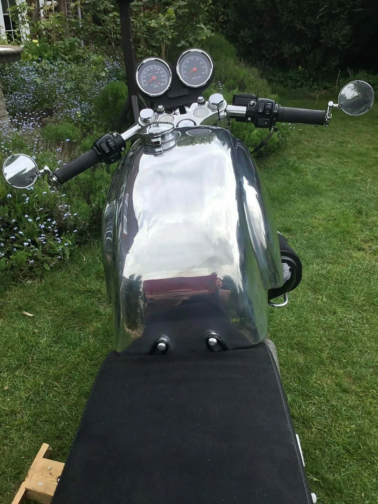 The iconic Cafe Racer 5 Gallon Manx tank on this gorgeous Harley Davidson Sportster.