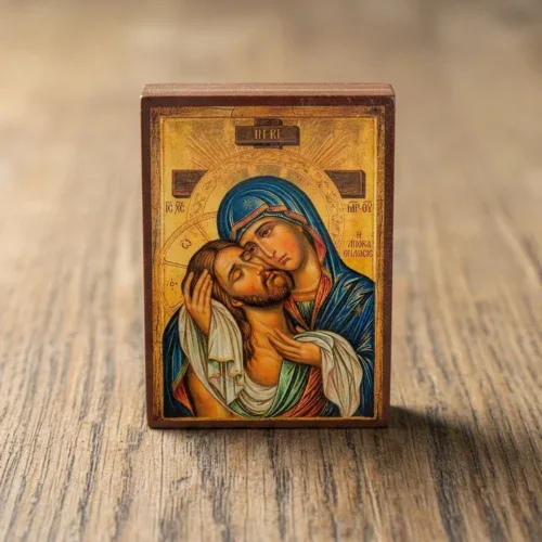 Holy Apokathelosis: Theotokos Embraces the Crucified Christ Holy Apokathelosis Orthodox wooden mounted icon showing the Theotokos embracing the Crucified Christ.