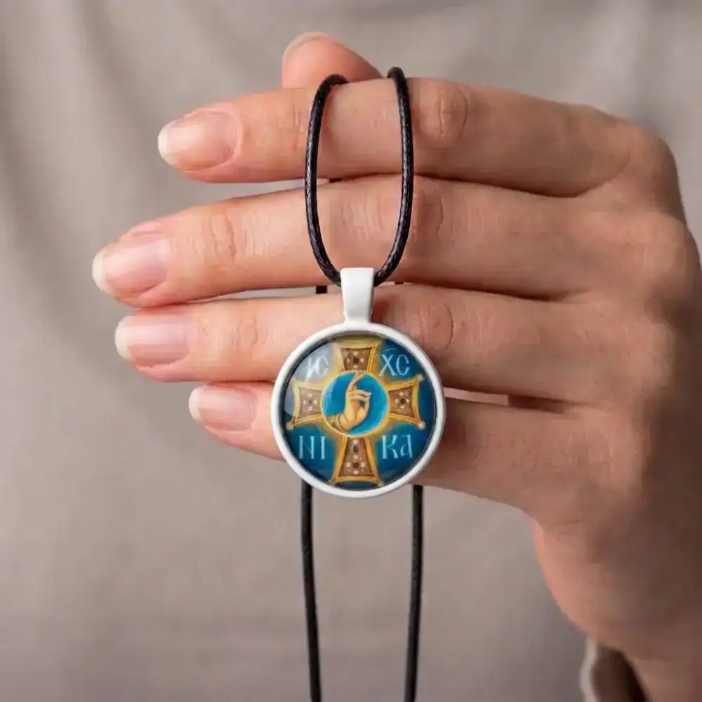 IC XC NIKA Blessing Hand Pendant Hand-Held View Hand-held IC XC NIKA Blessing Hand of Christ glass cabochon pendant necklace with white alloy bezel and black cord