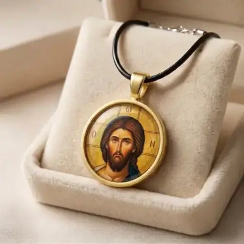 Jesus Christ glass cabochon pendant necklace with gold-tone bezel and black cord
