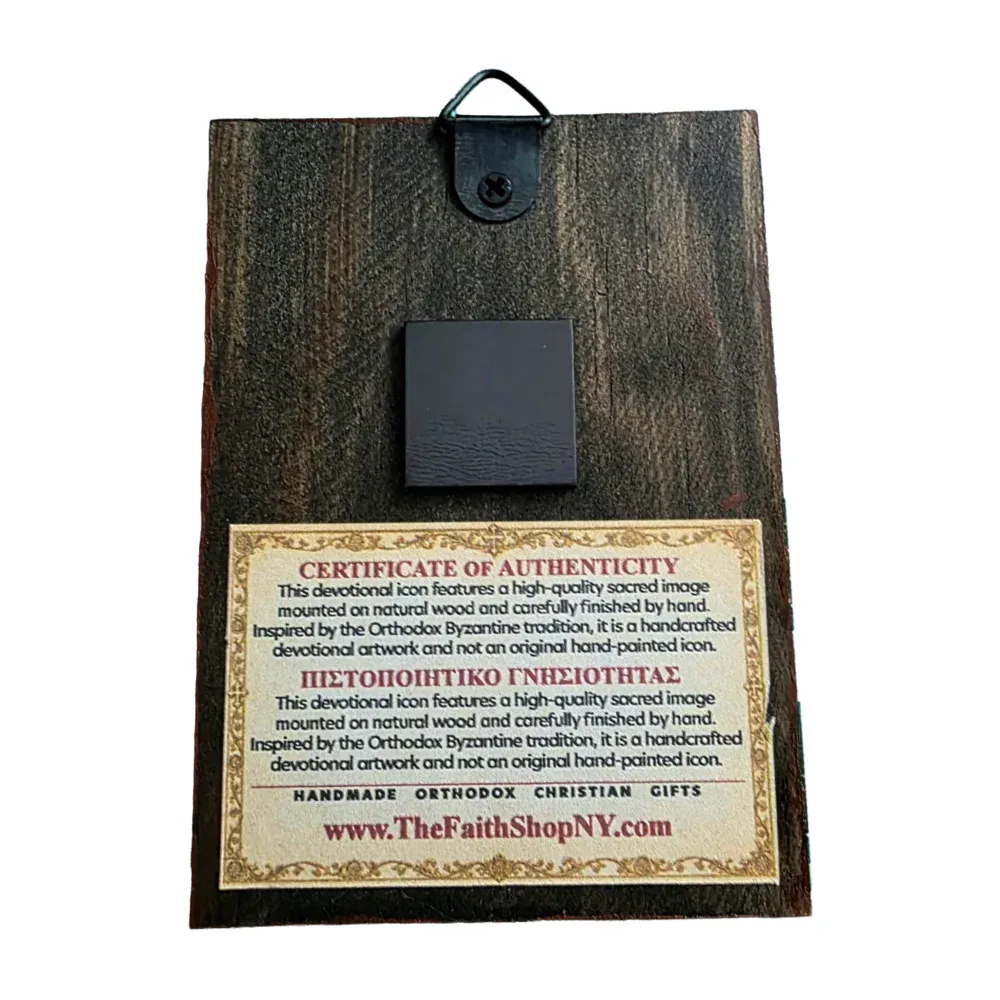 Orthodox Wooden Icon Back Side with D-Ring Hanger and Magnet Back side of a wooden Orthodox icon showing a metal D-ring hanger for wall mounting, a square magnet for metallic surfaces, and a Certificate of Authenticity label from TheFaithShopNY.com.