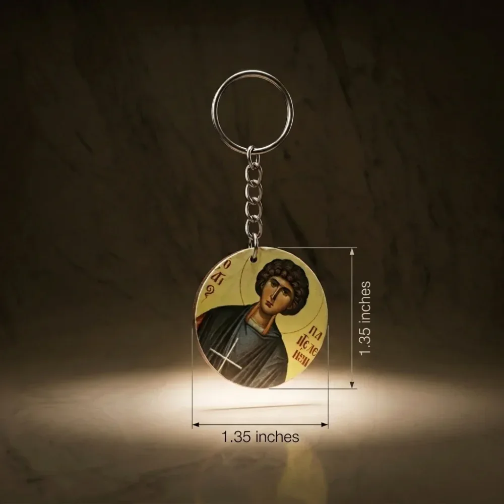 Saint Panteleimon Wood Mounted Keychain - Dimensions Guide Saint Panteleimon wood mounted keychain showing dimensions of 1.35 inches in height and 1.35 inches in width