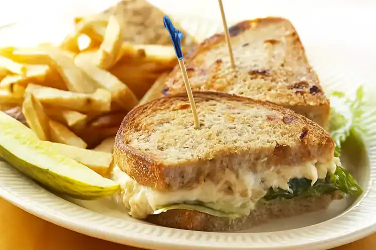 Delicious tuna melt sandwich with melted cheese and toasted bread.
