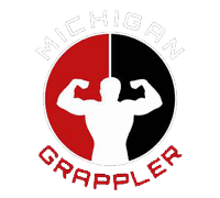 Wrestler in action at Michigan Grappler EP event, showcasing strength and technique.