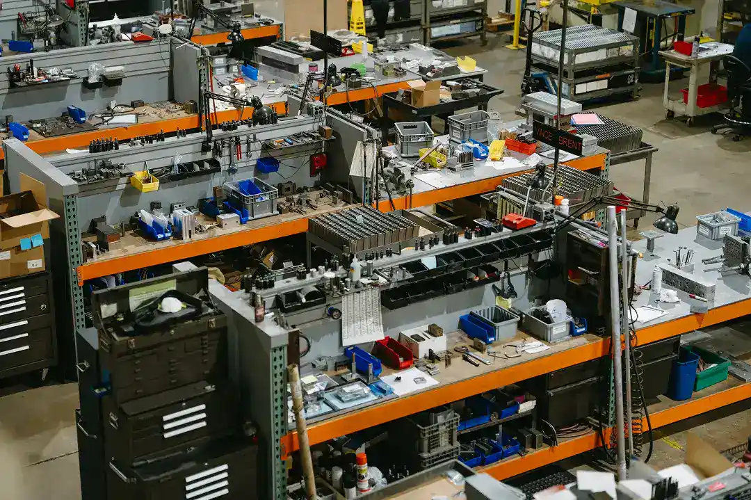Industrial manufacturing workspace with organized tools and equipment.