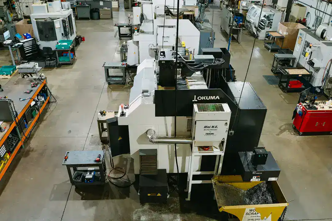 Industrial manufacturing equipment in a large factory setting.