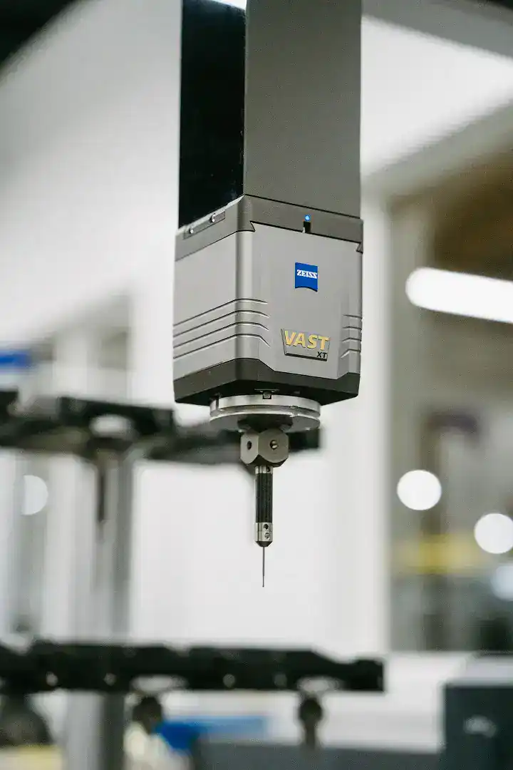 Precision industrial sensor used in manufacturing processes.