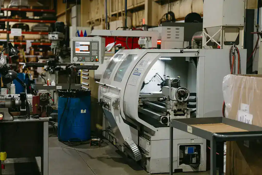 Industrial manufacturing machine in a factory setting.