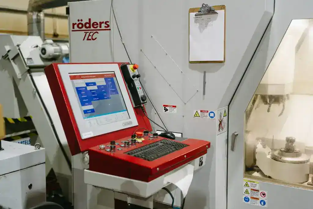 Industrial manufacturing machine with control panel at Active Manufacturing.