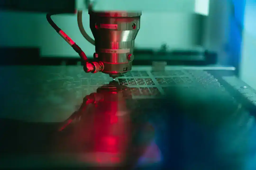 Precision laser cutting machine in active manufacturing process.