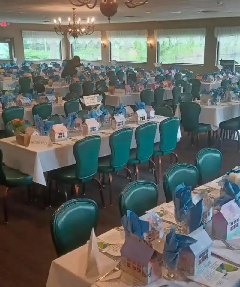Elegant banquet hall with decorated tables for events at Cascades Manor.