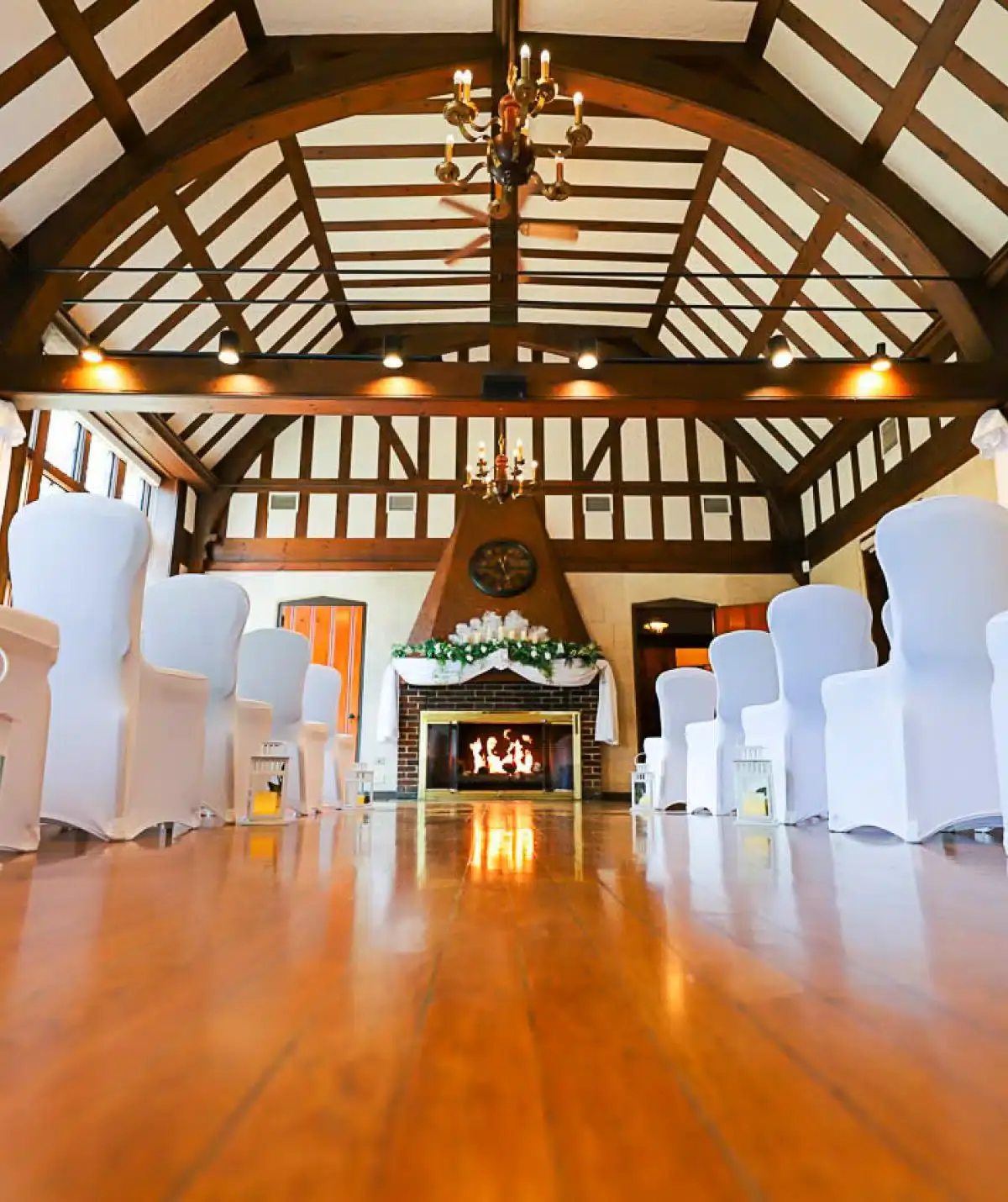 Event hall with high vaulted ceiling and elegant decor.