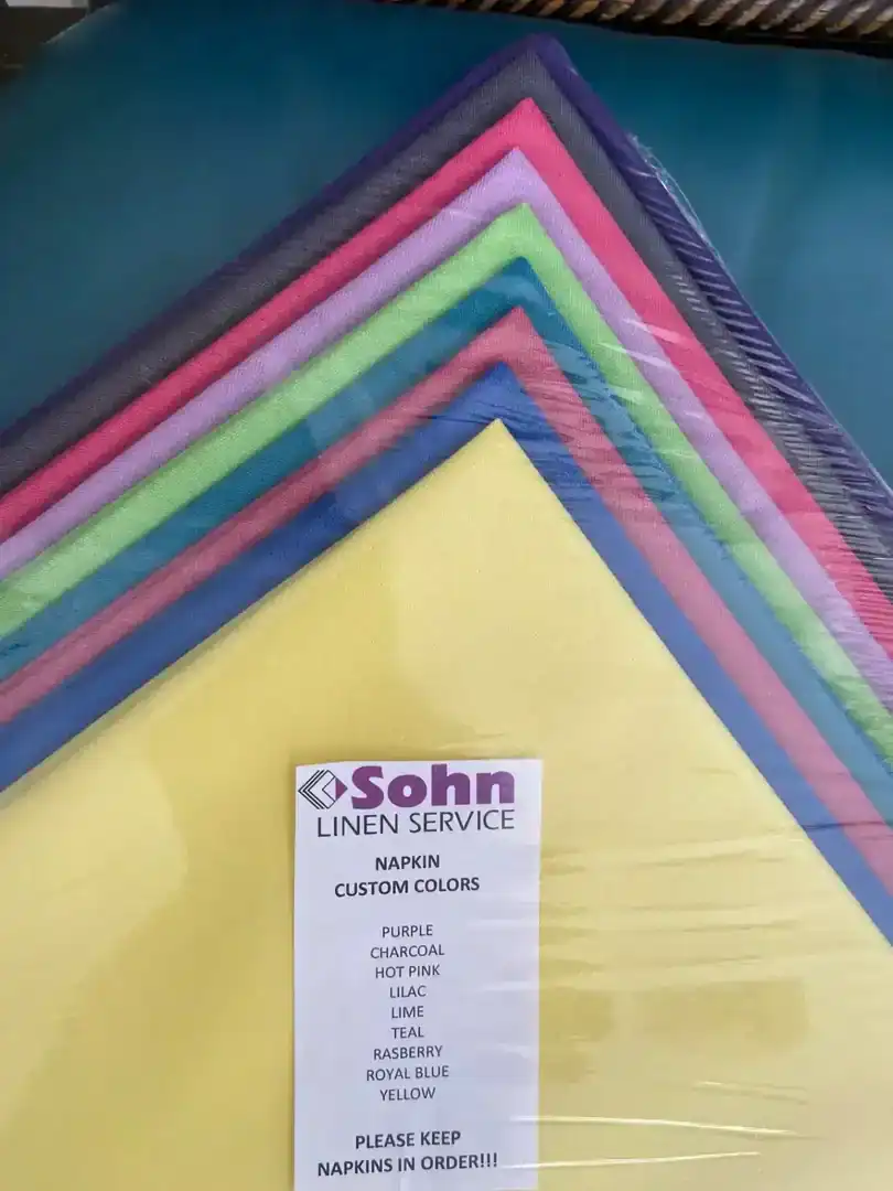 Colorful linen service napkins in various shades at Cascades Manor.