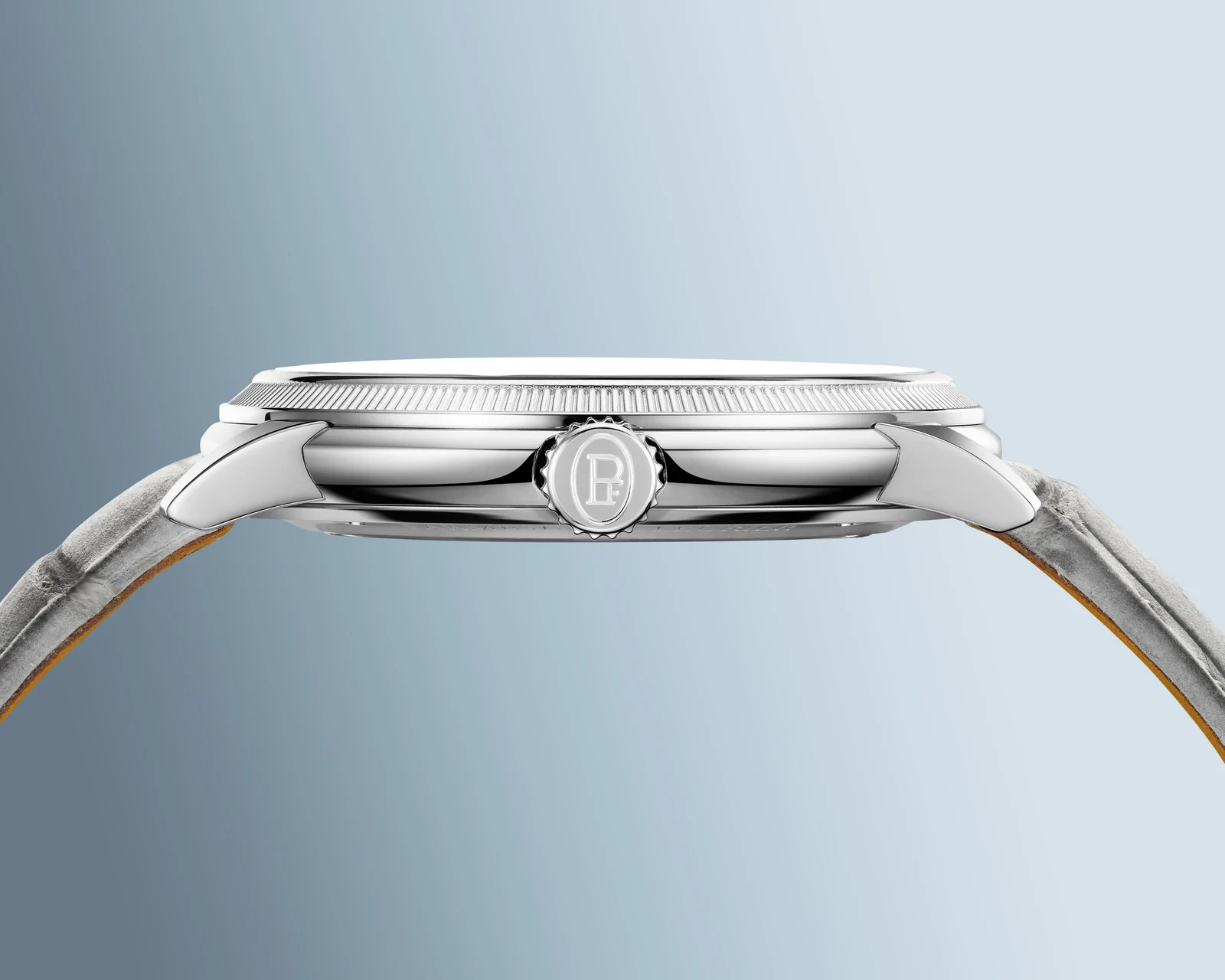 Profile of the Toric Petite Seconde Morning Blue 40.6mm platinum case, showing the knurled bezel and PF-engraved crown