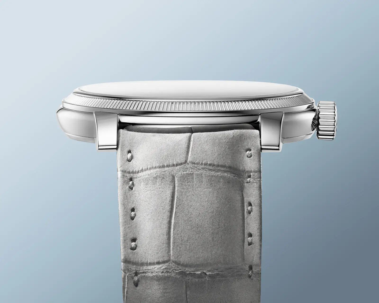 The Toric Petite Seconde Morning Blue on its Akoya Grey nubuck alligator strap with hand stitching