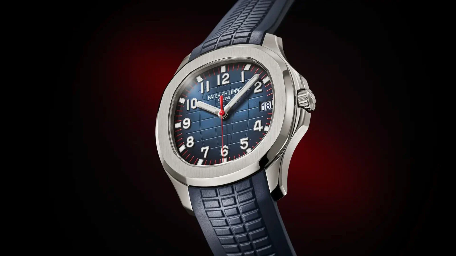 Patek Philippe Aquanaut Ref. 5167A-014 in steel with sunburst blue dial and red seconds hand, a Milan edition shown alongside the Patek Philippe 5978P